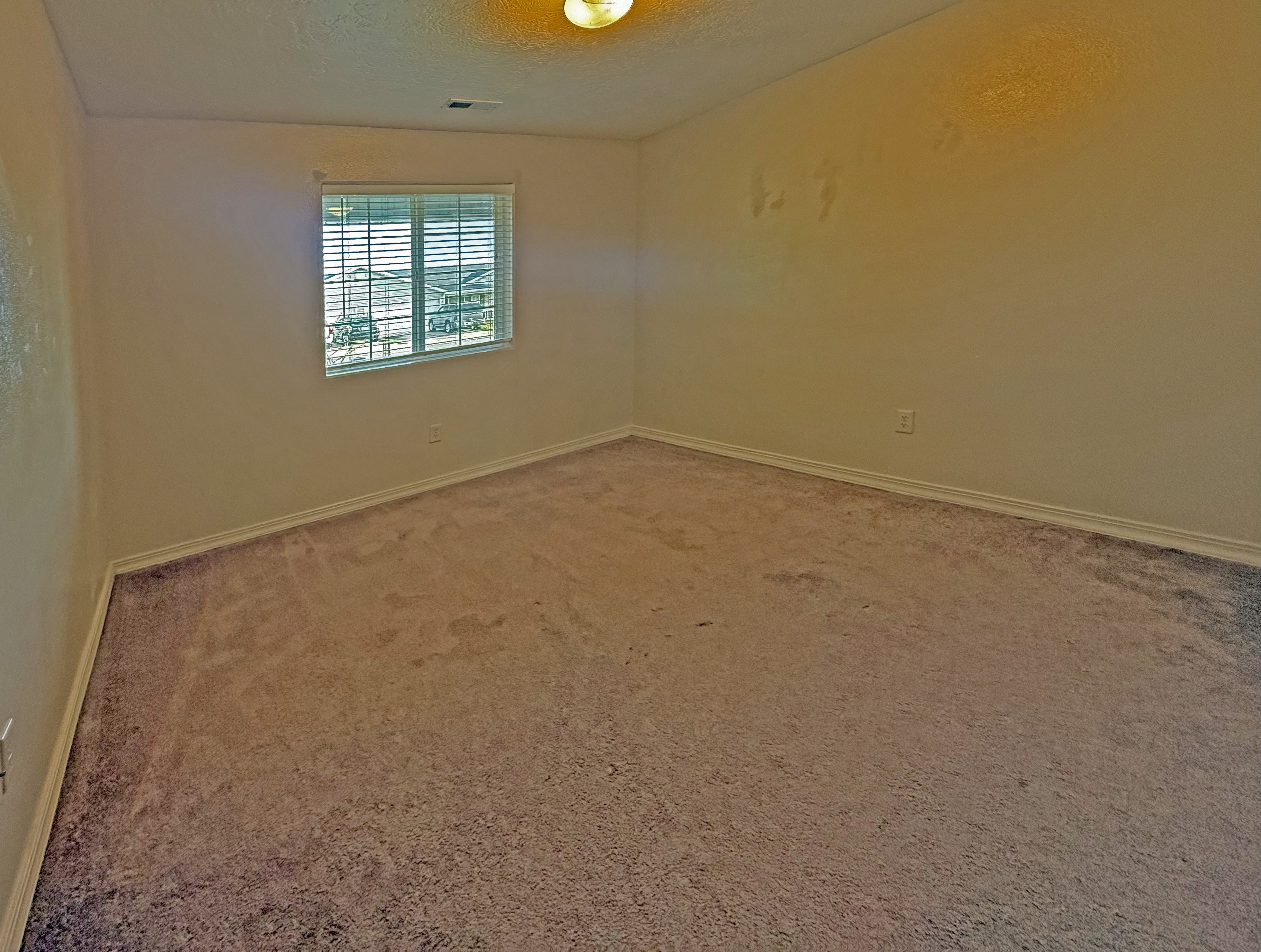 Third bedroom with street-facing window